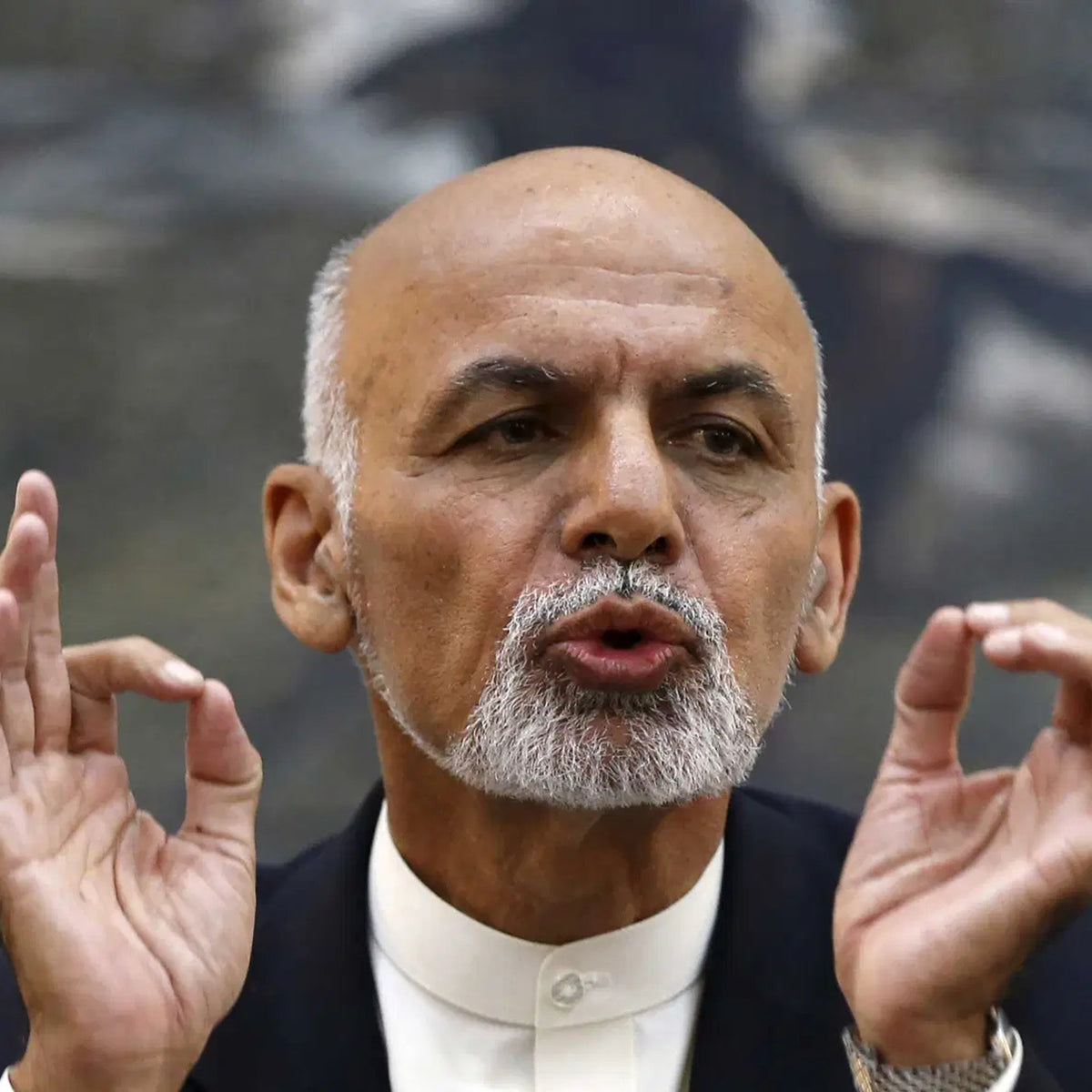 Russian embassy official says President Ghani left with cars, helicopt