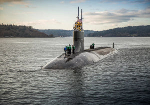 US submarine hits object underwater, 11 injured
