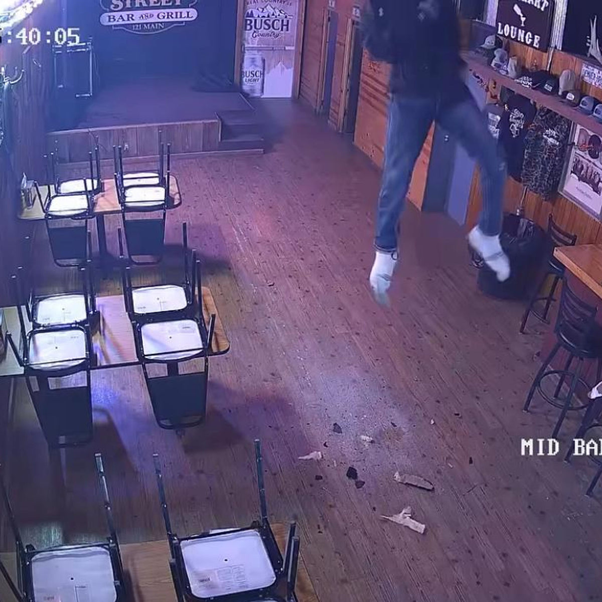 Suspect wanted after repelling into bar