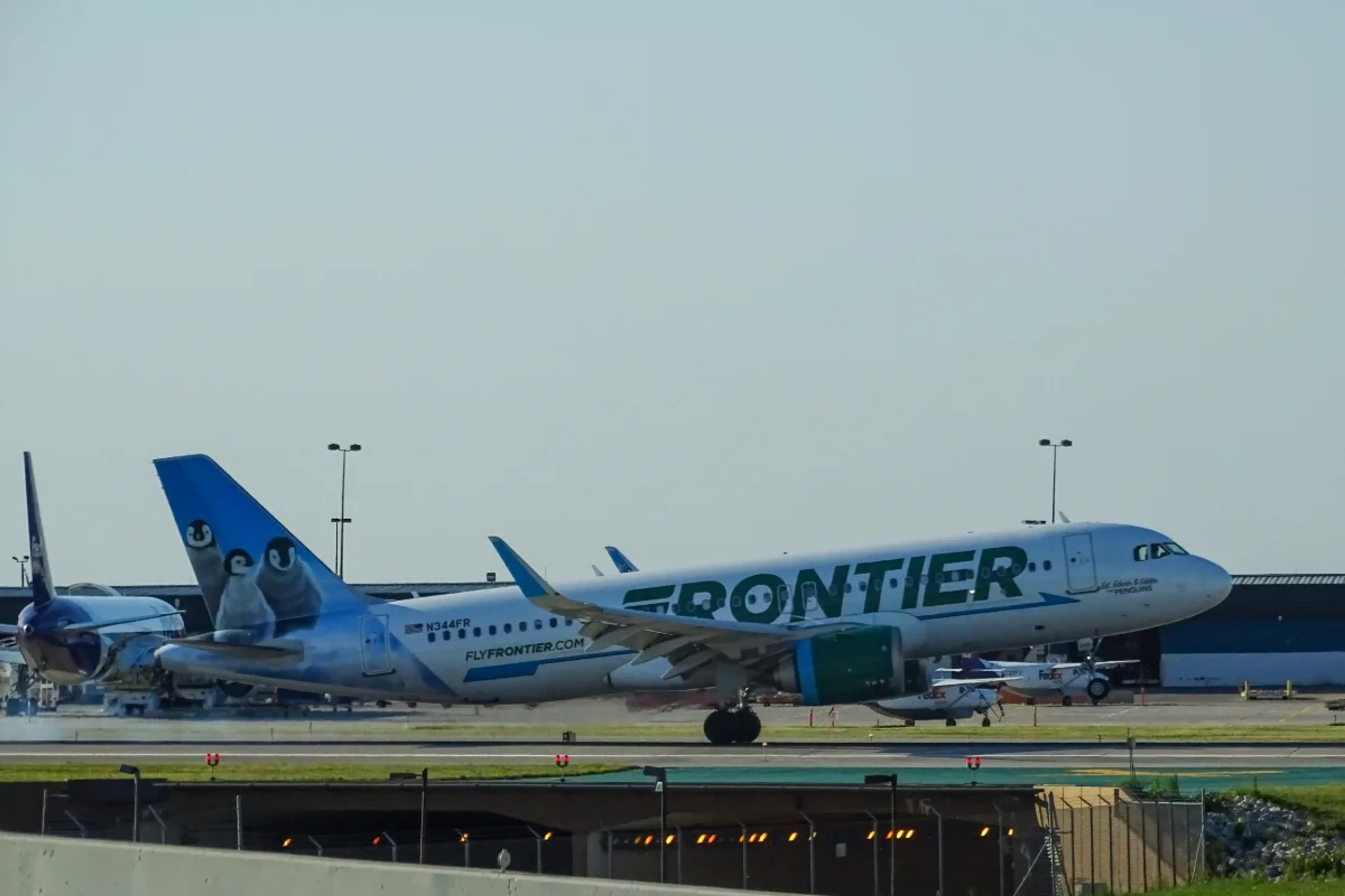 A Man Jumped a Runway Fence at Denver Airport. A Packed Frontier Airlines Jet Was Already Accelerating Toward Him.