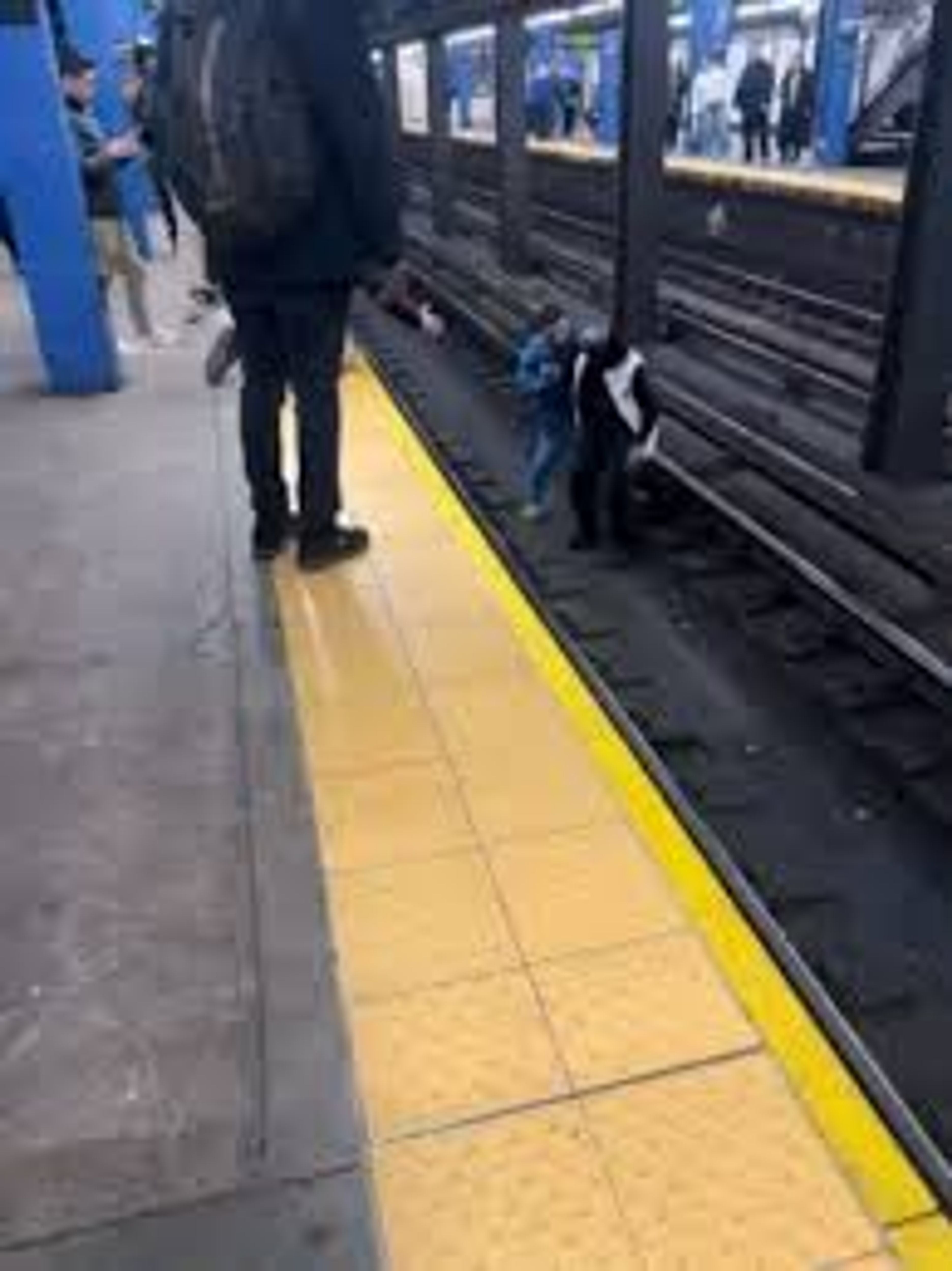 Marine Saves Man From Subway Tracks